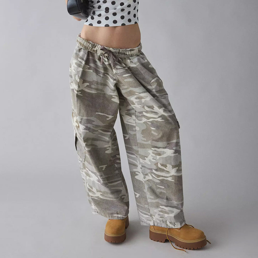 Women's wide cargo pants with elastic waistband and large flap pockets