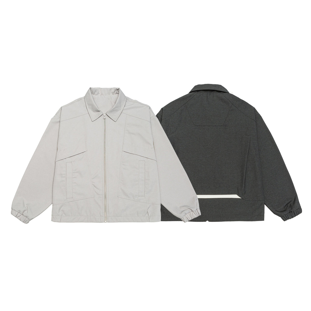 Unisex short jacket in boxy cut with shirt collar, visible metal zipper and utility patch pockets EVA-US