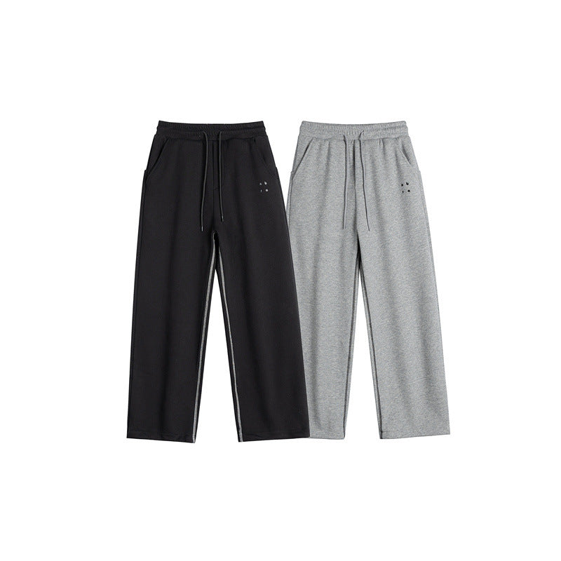 Women's sweatpants with wide legs, elastic waistband and drawstring