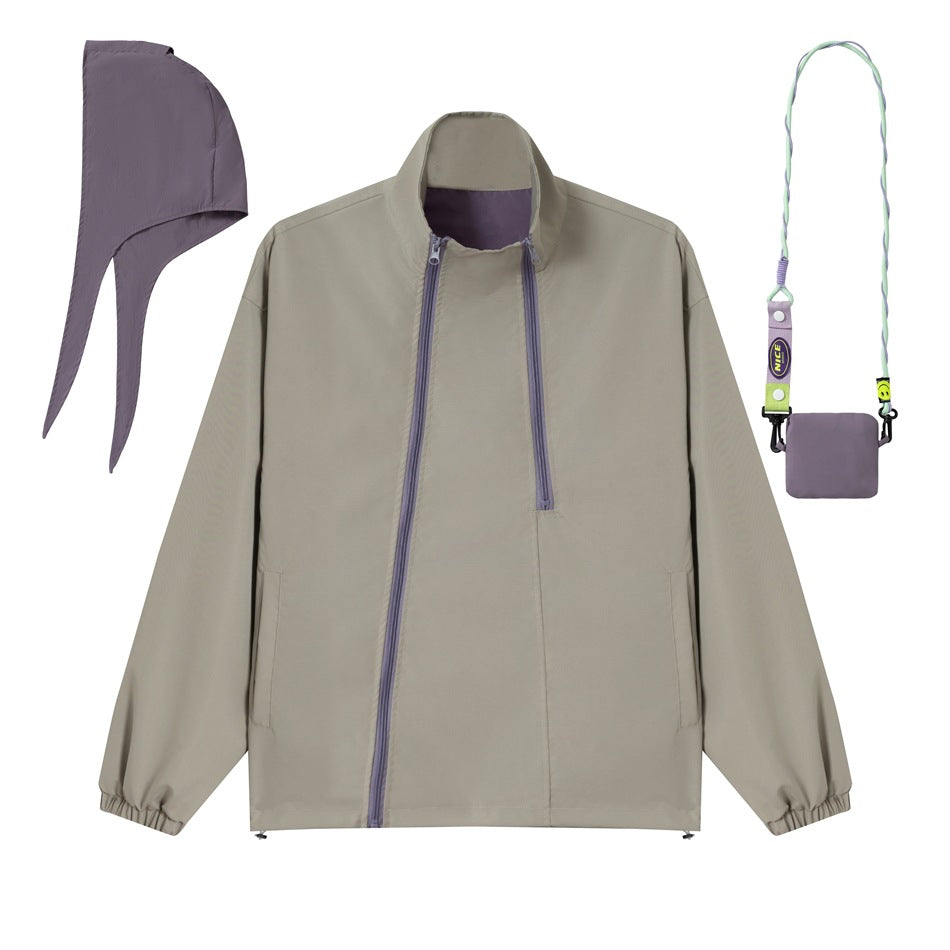 Unisex short cut technical windbreaker with asymmetric two-way zipper, detachable storm hood and shoulder mini bag EVA-US