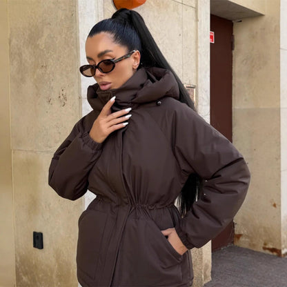 Women's quilted parka with high collar, fitted drawstring, and hood EVA-US