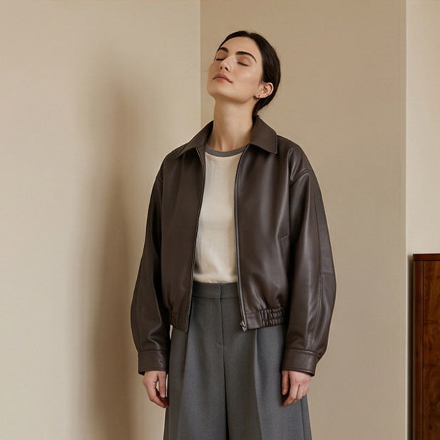 Women Boxy Cropped Faux Leather Jacket with Concealed Zipper and Elastic Hem EVA-US