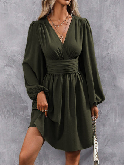 Women's wrap dress with a stylish V-neck and voluminous sleeves