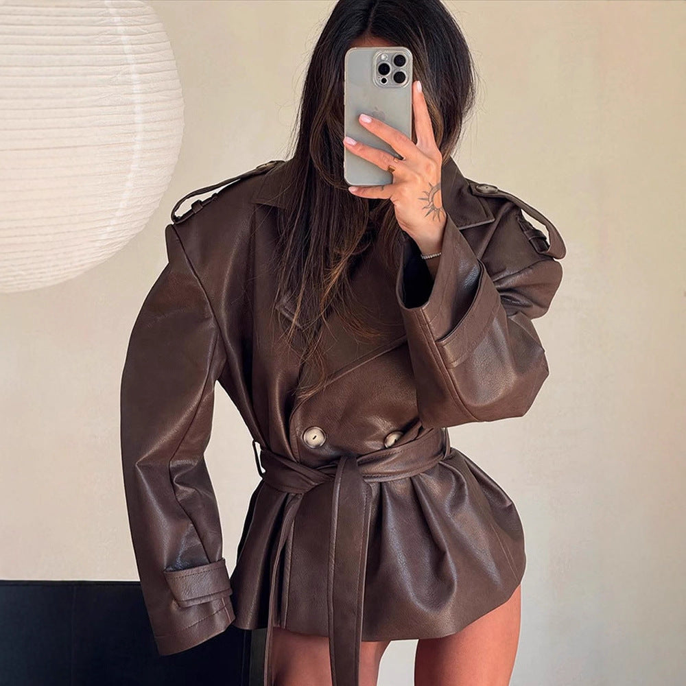 Women's short jacket made of faux leather with waistbelt and oversized shoulder area EVA-US