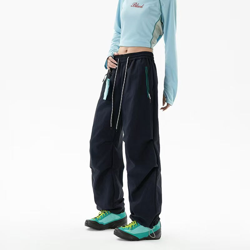 Loose trekking pants with water-repellent quick-drying coating elastic drawstring waistband and zip pockets EVA-US