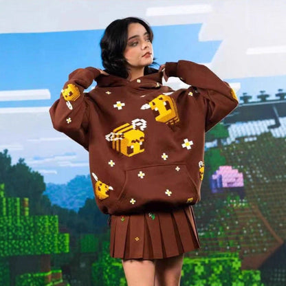 Unisex knitted hoodie with integrated pixel bee design and applied kangaroo pocket EVA-US