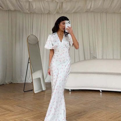 Women’s maxi dress with floral satin look, tailored silhouette and short puff sleeves EVA-US