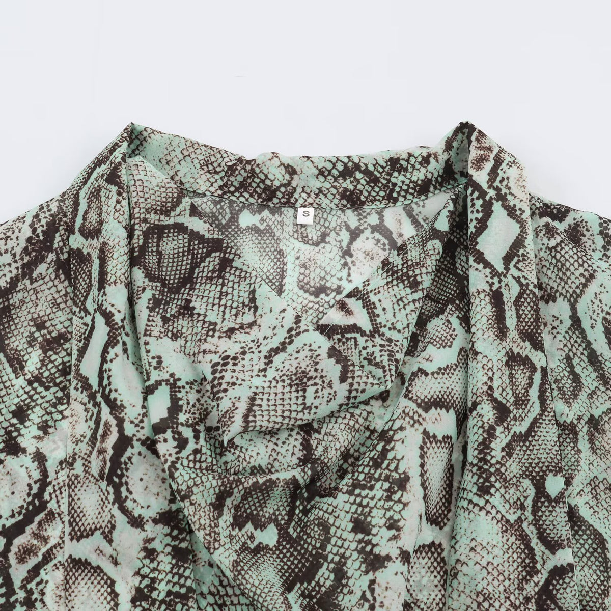 Women's blouse with waterfall shawl collar and snake print EVA-US