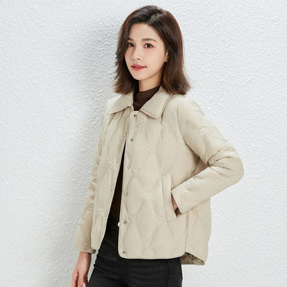 Women Short Cut Quilted Jacket with Decorative Stitching and Rounded Hem EVA-US