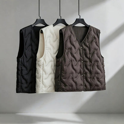 Women’s lightly padded quilted vest with V-neck and press studs EVA-US