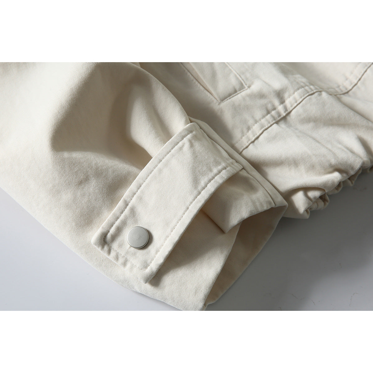 Men's short-cut boxy blouson jacket with faux leather collar, drawstring hem, and snap button cuffs EVA-US