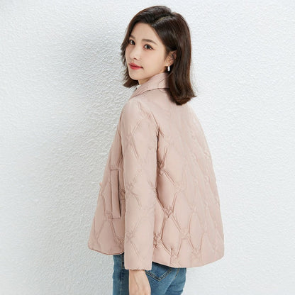 Women Short Cut Quilted Jacket with Decorative Stitching and Rounded Hem EVA-US