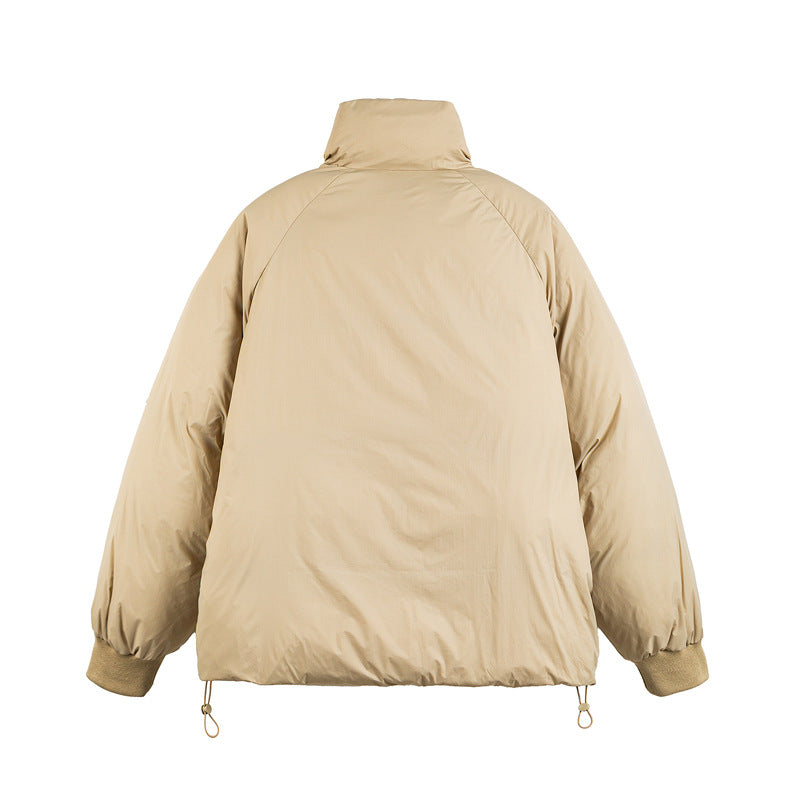 Unisex Boxy-padded short jacket with high stand-up collar, raglan sleeves and drawstring hem EVA-US