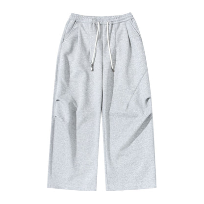 Women's Wide Cropped Jogging Pants made of French Terry with a high elastic waistband, drawstring, and side pockets EVA-US