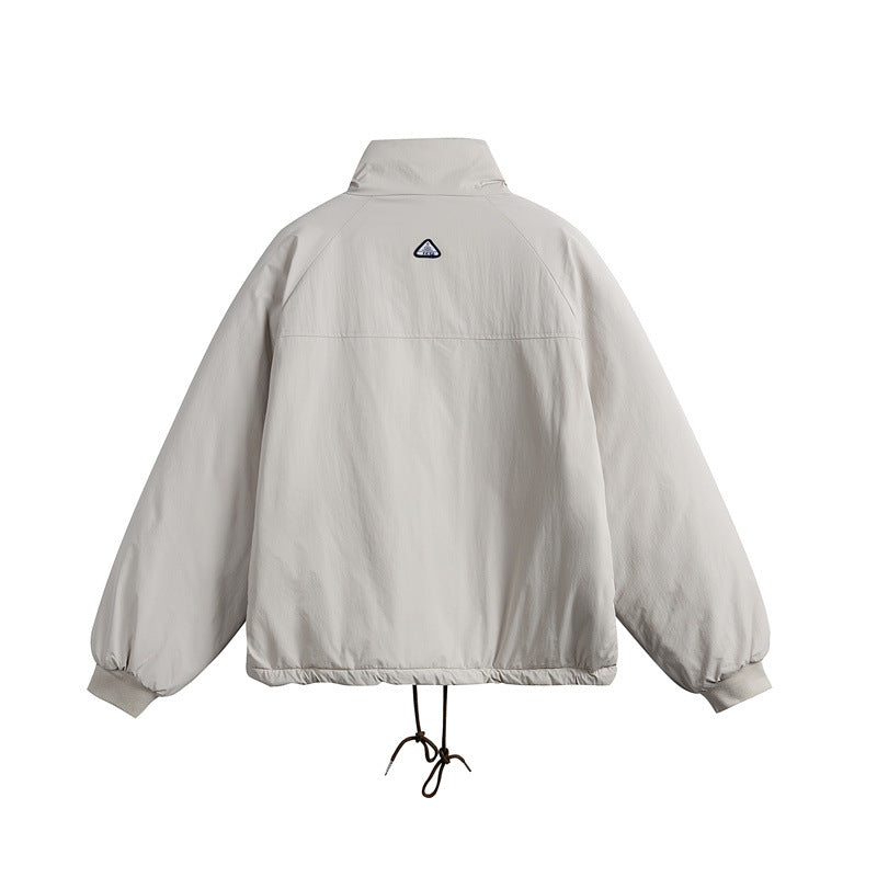Unisex Short cut boxy padded jacket with drawstring and raglan sleeves EVA-US