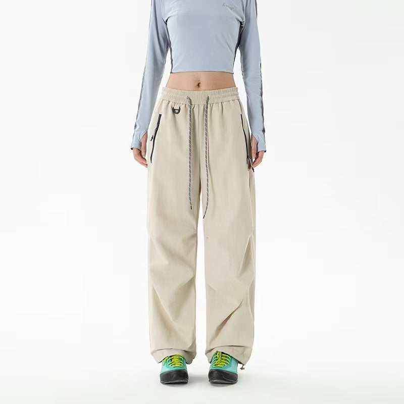 Loose trekking pants with water-repellent quick-drying coating elastic drawstring waistband and zip pockets EVA-US