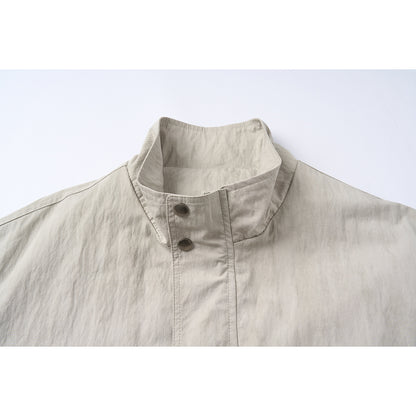 Unisex Short Jacket in minimalist Workwear look with high stand-up collar and snap button closure EVA-US