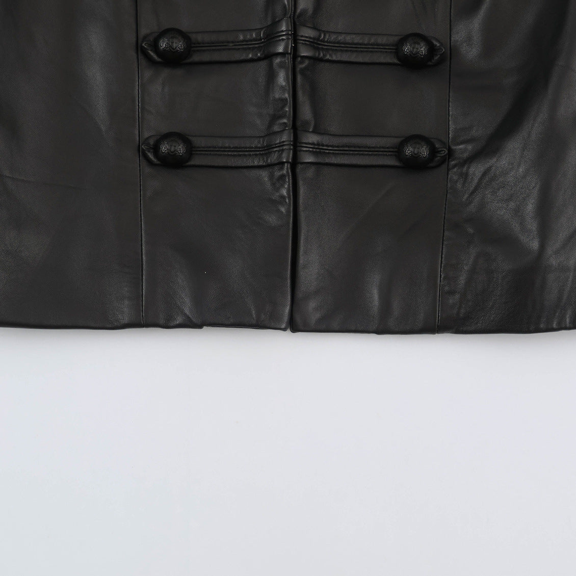 Women tailored military-inspired leather jacket with stand-up collar, decorative strap and button placket EVA-US