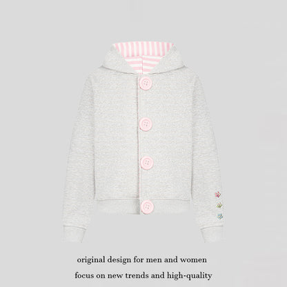 Women's hooded sweat jacket with oversized buttons, striped inner lining, and ribbed cuffs.