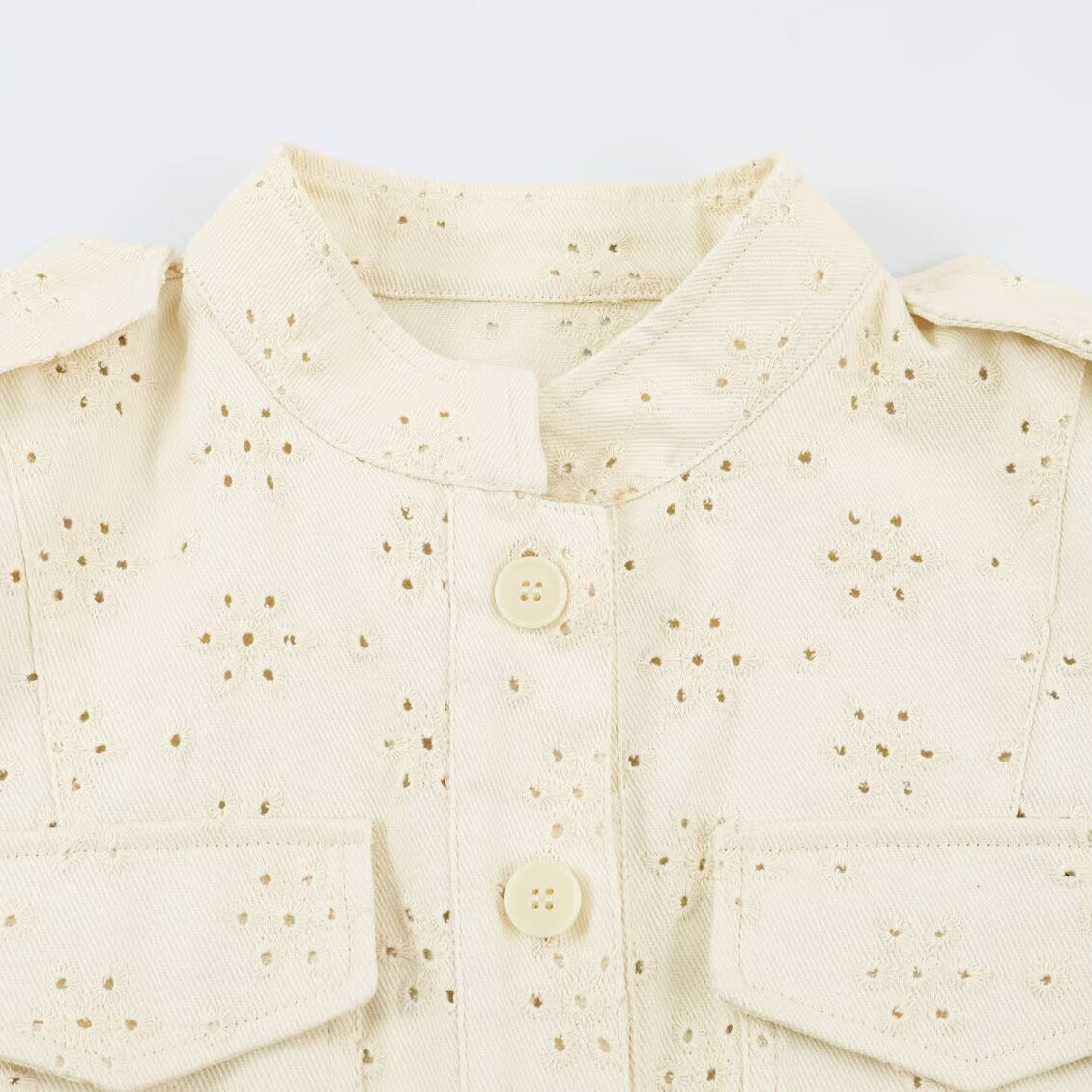 Ladies short jacket made of broderie anglaise with stand-up collar and patch pockets EVA-US