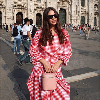 Women's checkered maxi dress with continuous button placket, fitted sash, and extended cuffs EVA-US