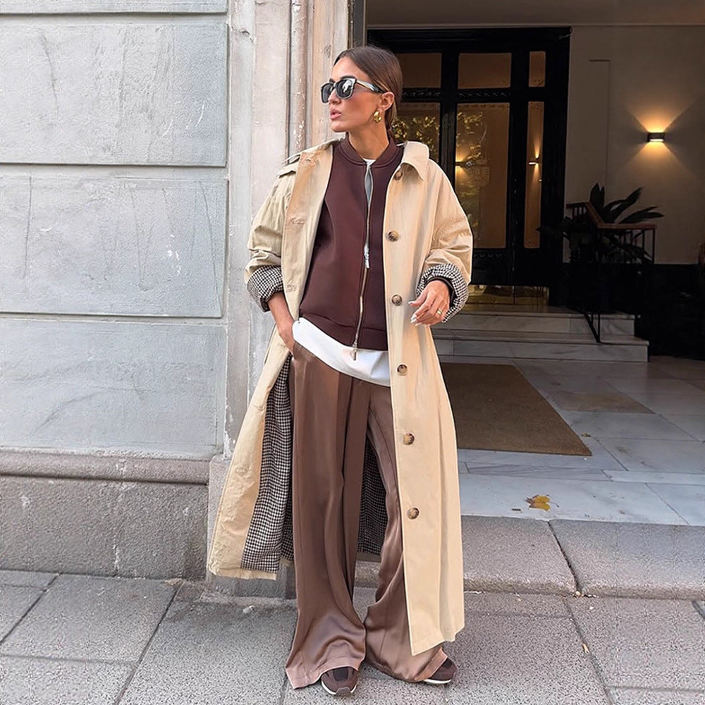 Women's maxi-length trench coat with check lining, wide fall & classic button placket