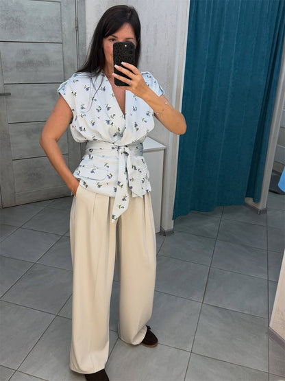 Women's Sleeveless Wrap Top with Tailored Tie Belt and Patch Pockets EVA-US