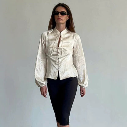 Women's Jacquard Satin Blouse with Stand Collar, Tie Ribbons and Tailored Peplum EVA-US