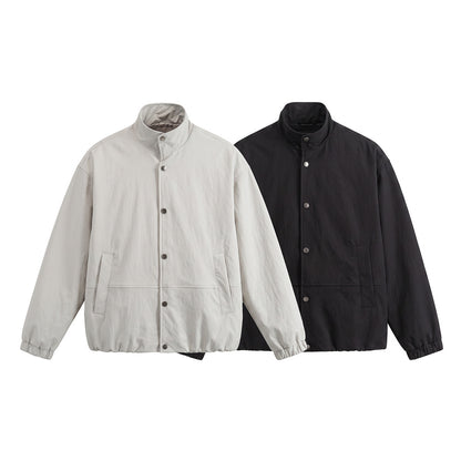 Men's short-cut minimalist boxy blouson with stand collar and press stud placket EVA-US