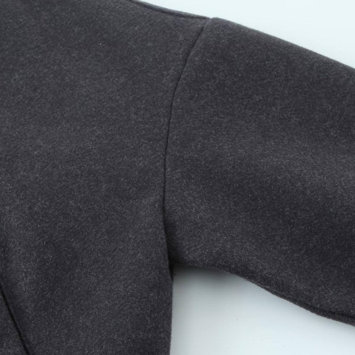Women's short bomber-style jacket with stand-up collar, snap button placket, and elastic hem EVA-US