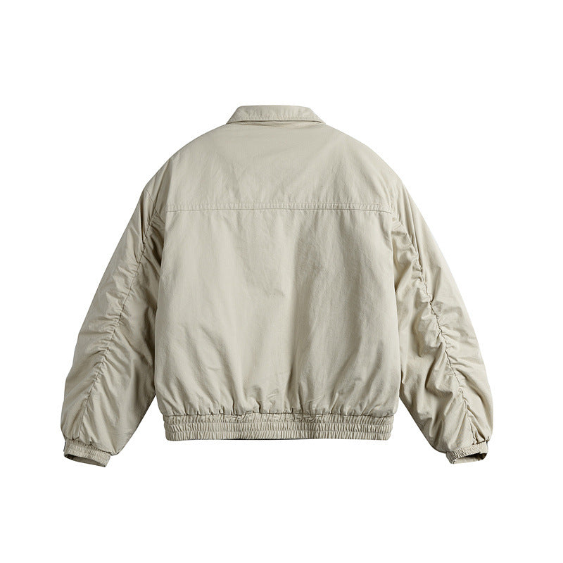 Men's short boxy blouson with shirt collar, utility chest pockets, and elastic hem EVA-US