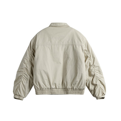 Men's short boxy blouson with shirt collar, utility chest pockets, and elastic hem EVA-US