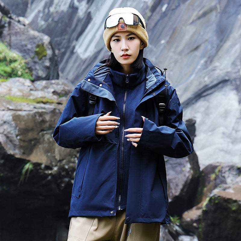 Women’s technical multi-layer hardshell rain jacket with adjustable hood, chest strap, and water-resistant zippers EVA-US