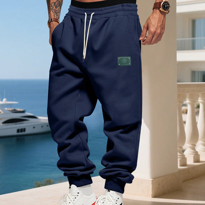 Men's comfortable jogging pants with adjustable waistband and practical side pockets EVA-US