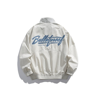Unisex Lightweight Boxy Blouson Jacket with Stand-up Collar, Elastic Cuffs and Embroidered Chest Detail EVA-US