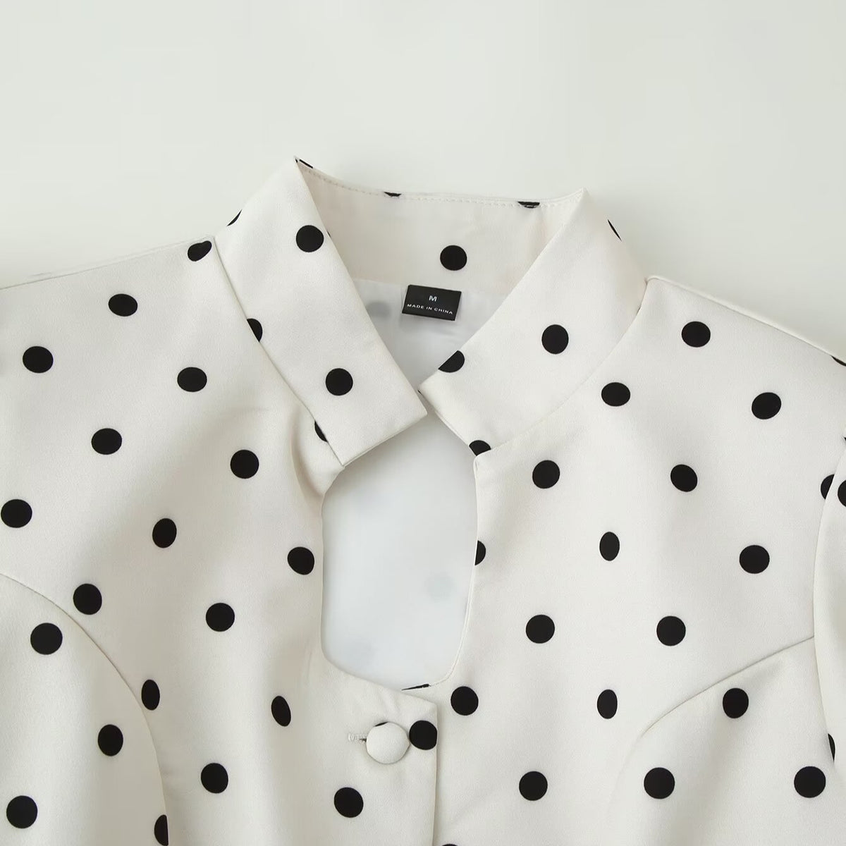 Women's Polka Dot Blouse with Stand Collar, Puff Sleeves, and Peplum Hem EVA-US