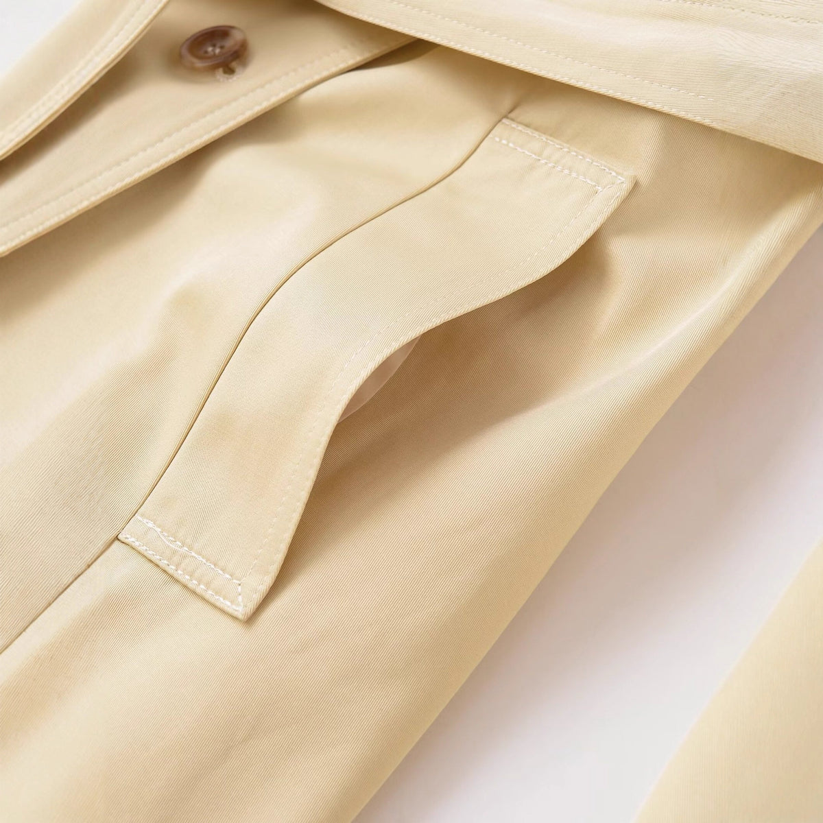 Women's midi trench coat made of lightweight functional fabric with tied belt and storm flap EVA-US