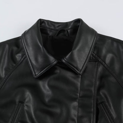 Women’s short jacket made of faux leather with a waist belt and oversized sleeves EVA-US