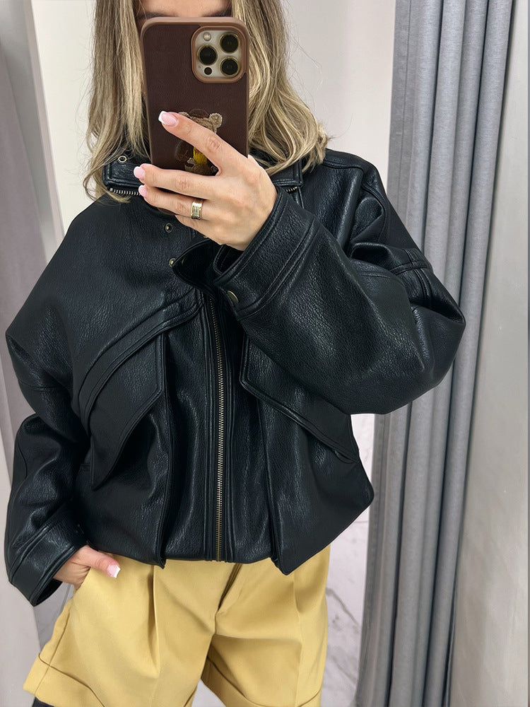 Women's oversized bomber jacket made of textured faux leather with overlapping flap front EVA-US