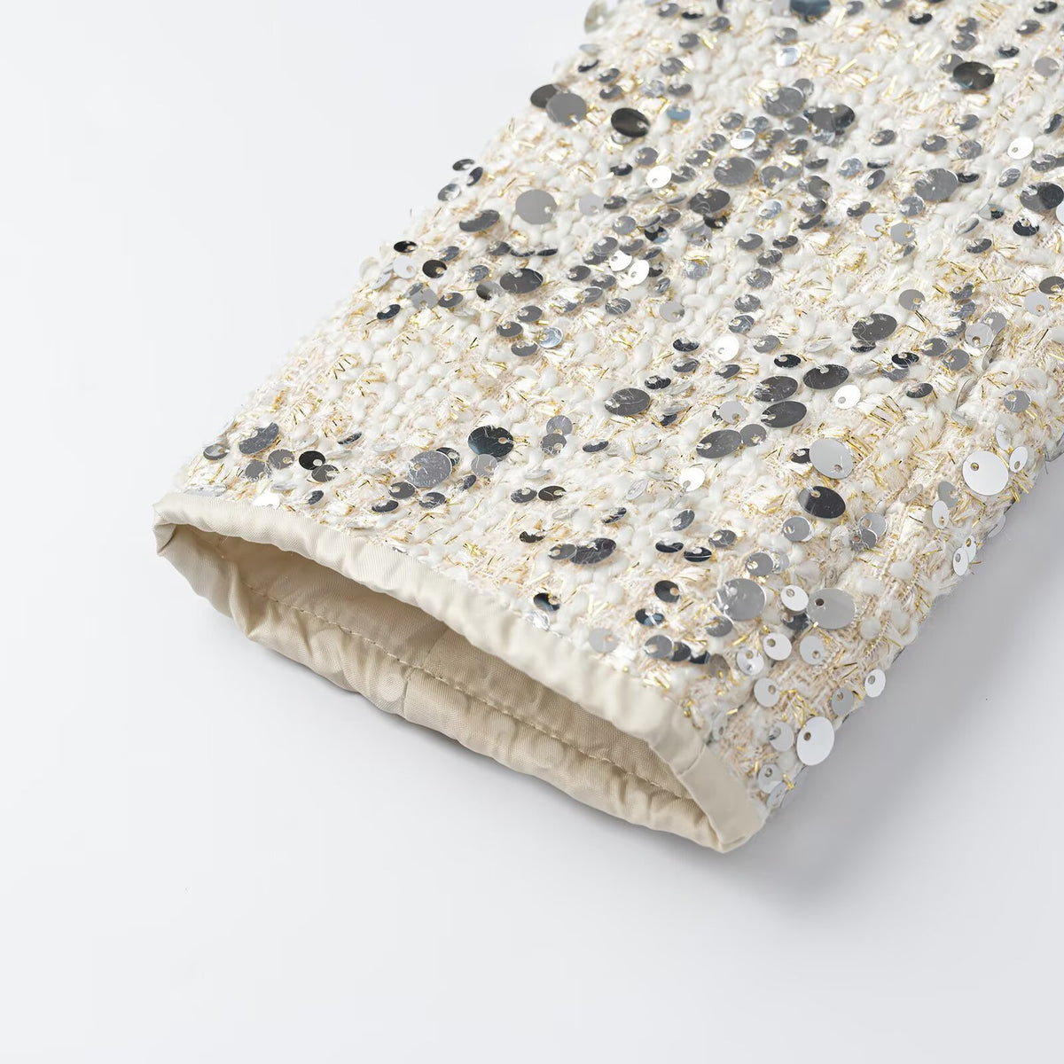 Women's short jacket made of bouclé with sequin trim, decorative pearl buttons, and a belted waist EVA-US