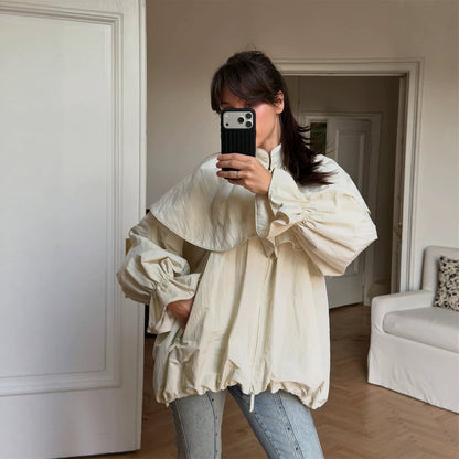 Women's oversized jacket with cape collar, balloon sleeves, and drawstring EVA-US