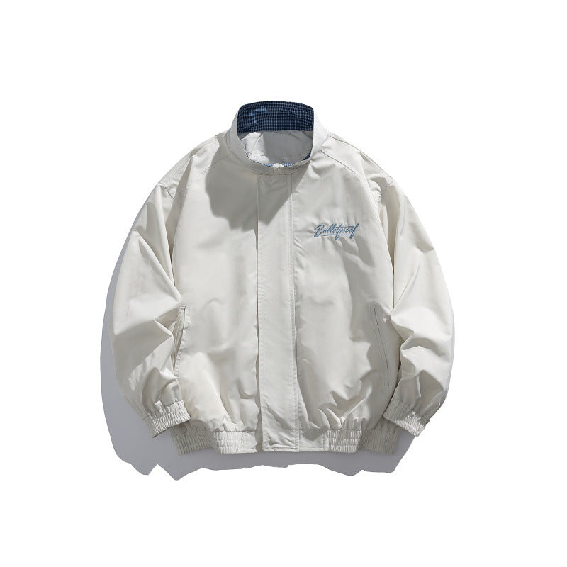 Unisex Lightweight Boxy Blouson Jacket with Stand-up Collar, Elastic Cuffs and Embroidered Chest Detail EVA-US