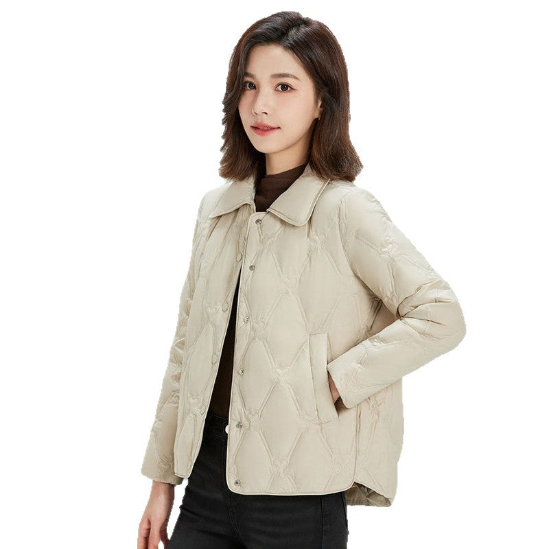 Women Short Cut Quilted Jacket with Decorative Stitching and Rounded Hem EVA-US