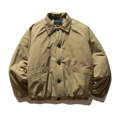 Men's short padded jacket with raglan sleeves, large flap pockets, and elastic hem EVA-US
