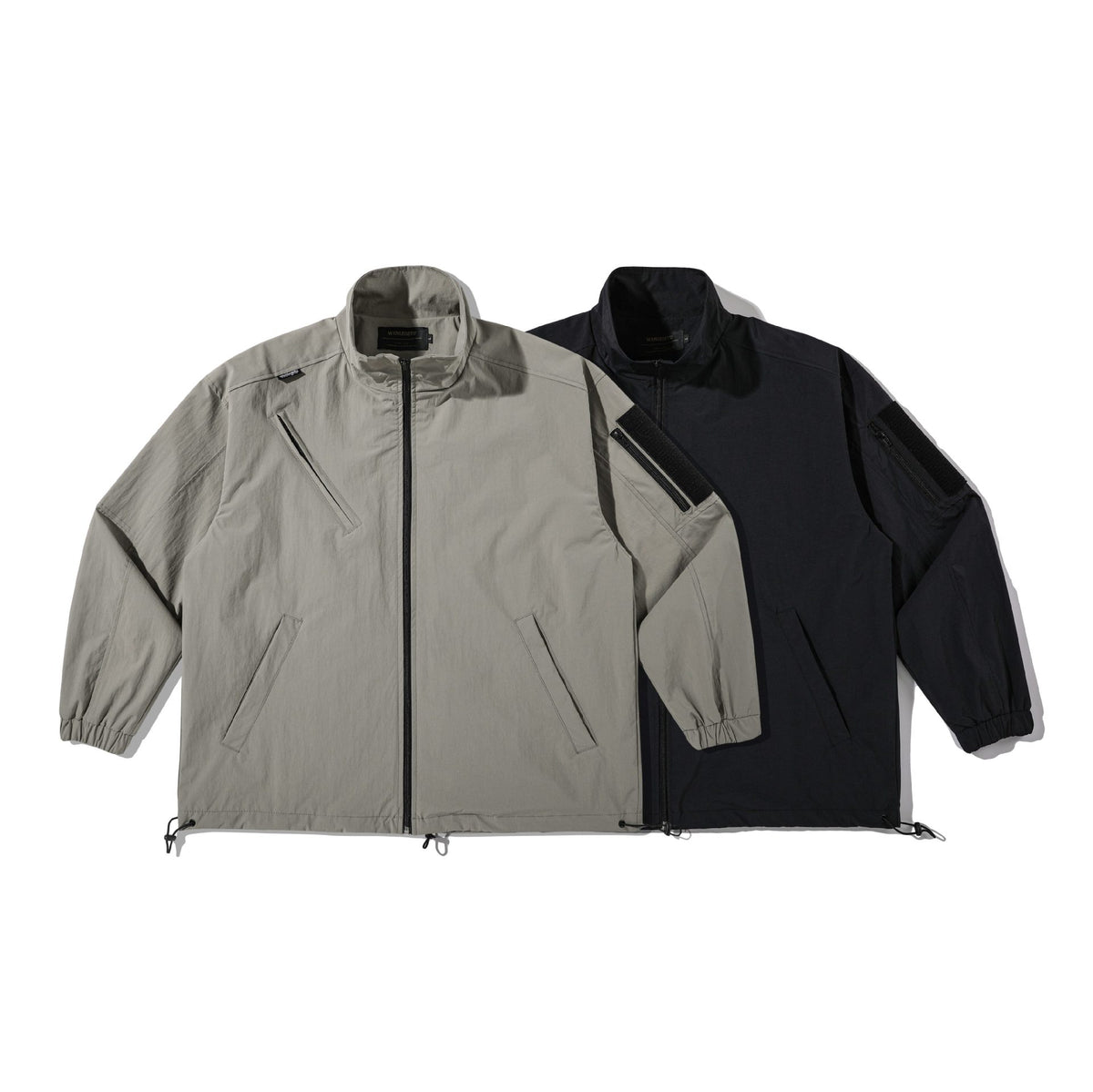 Unisex Lightweight Technical Wind Parka with Drawstring, Zipper Pockets and Sleeve Utility Pocket EVA-US