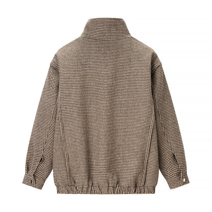 Women's transitional jacket in houndstooth pattern with stand-up collar and elastic hem