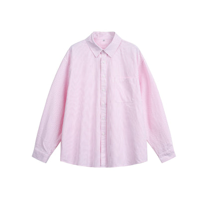 Women's loosely cut shirt blouse with fine striped texture, Kent collar and chest pocket.