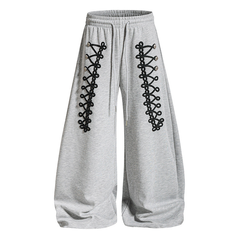 Women's loose jogging pants with elastic waistband and decorative lacing EVA-US