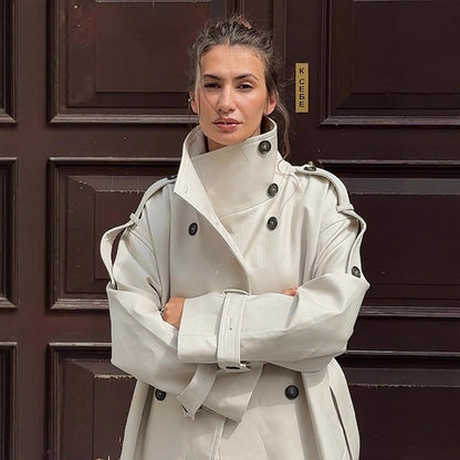 Women's waistless long trench coat in oversized cut with double button placket and shoulder flaps EVA-US