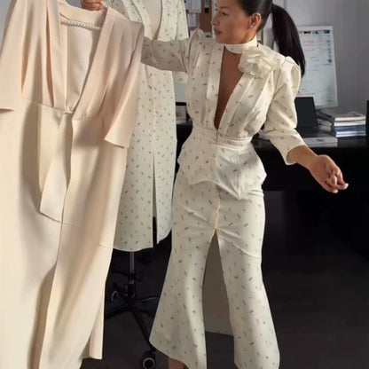 Women tailored pantsuit set with deep V-neck, structured peplum waist, and fine floral jacquard EVA-US